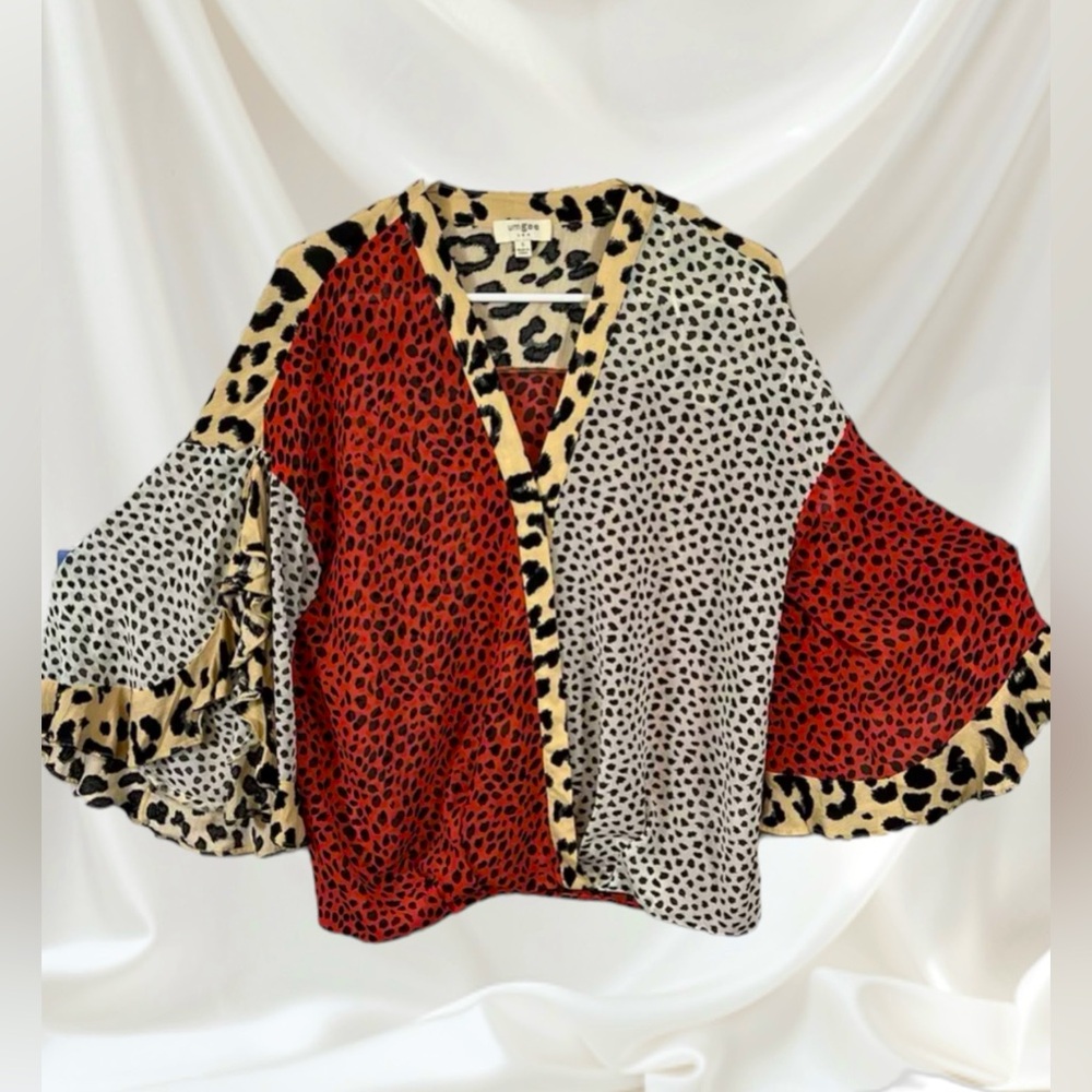 UMGEE ANIMAL PRINT RUFFLED SLEEVE SURPLICE TOP. LIGHTWEIGHT SHEER, HIGH LOW HEM
